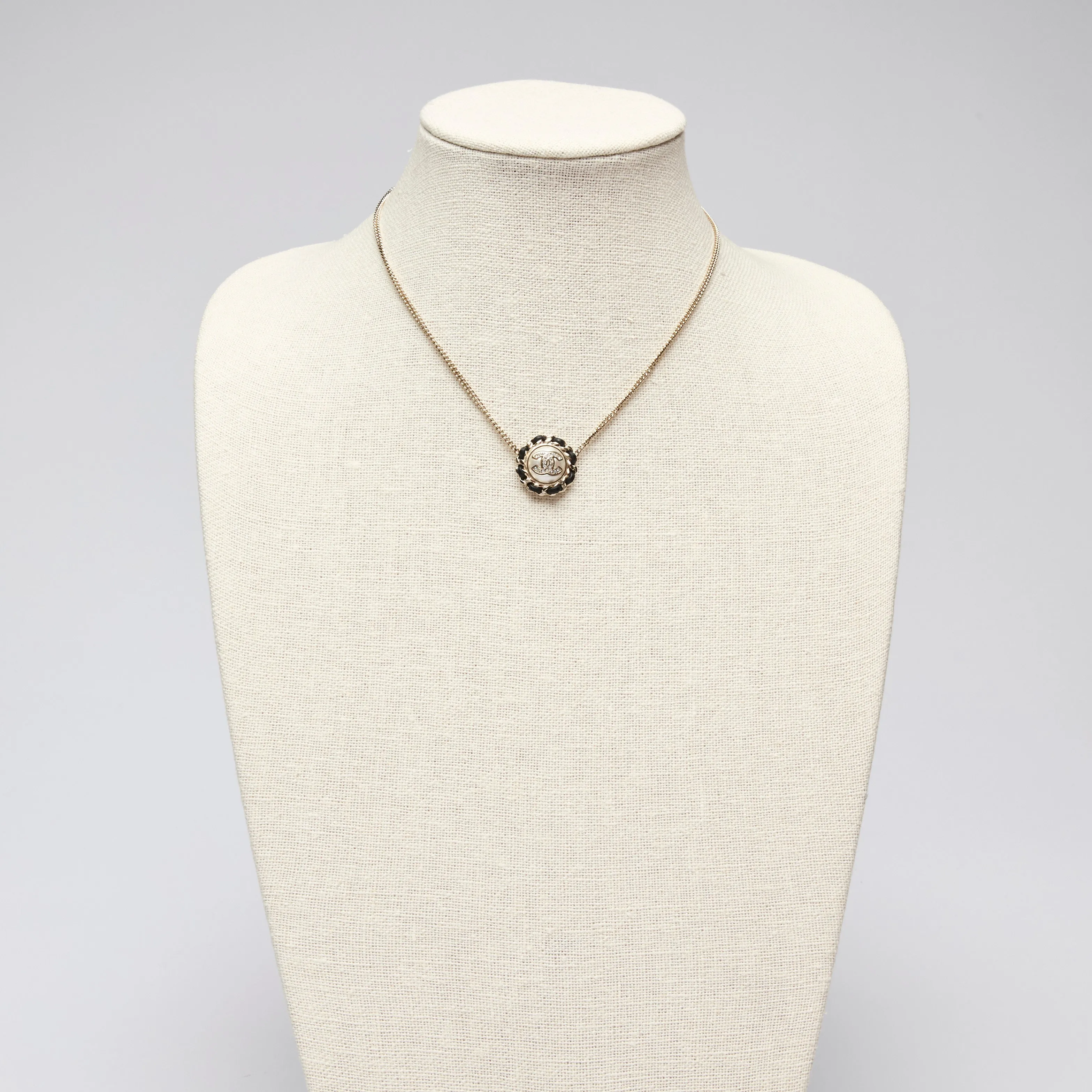 Pre-Loved Chanel™ Gold Tone Interlocking Letter Logo Pendant Necklace.
