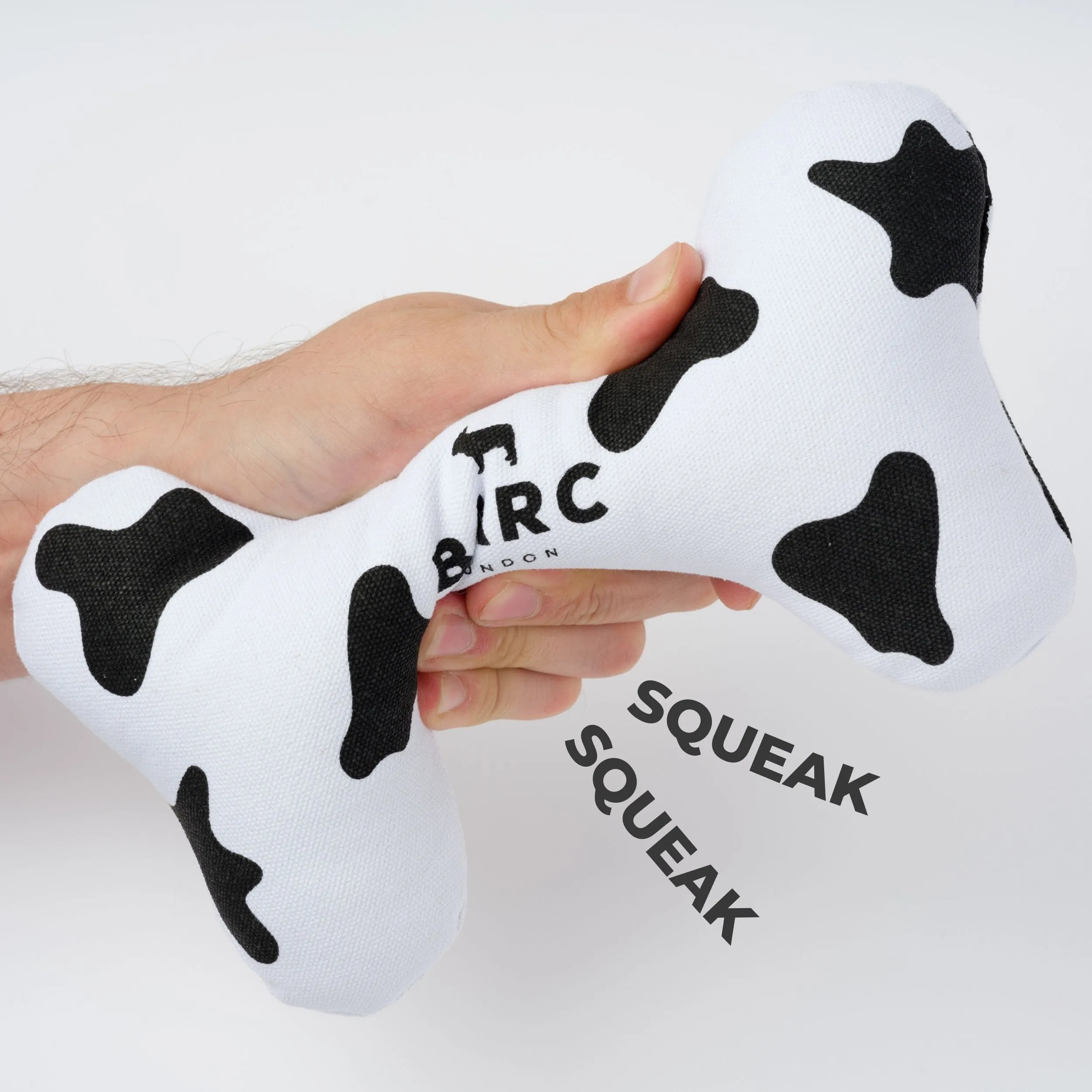 Squeaky Canvas Dog Bone Toy | Cow Print
